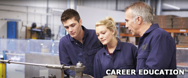 Two students and their teacher working on machinery, used to represent the Career Education Department